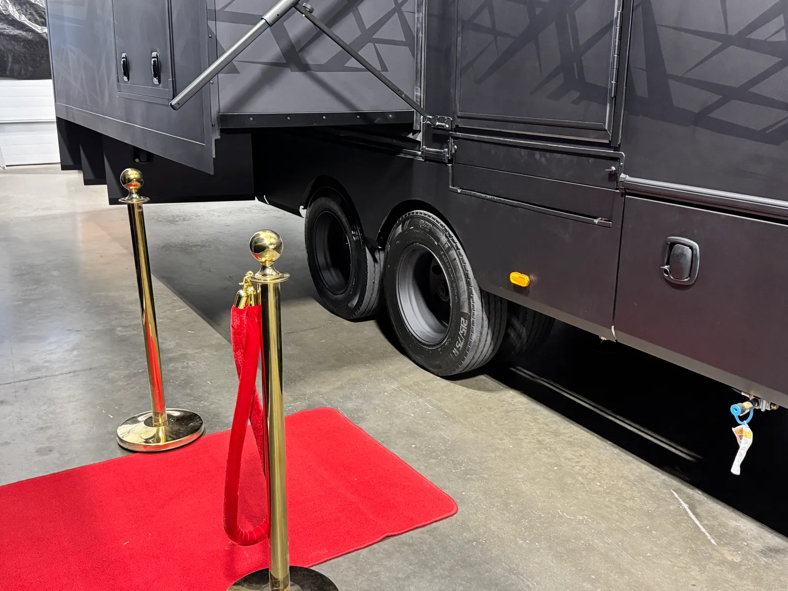 The entry steps fully stowed beneath the side of the Aurum.