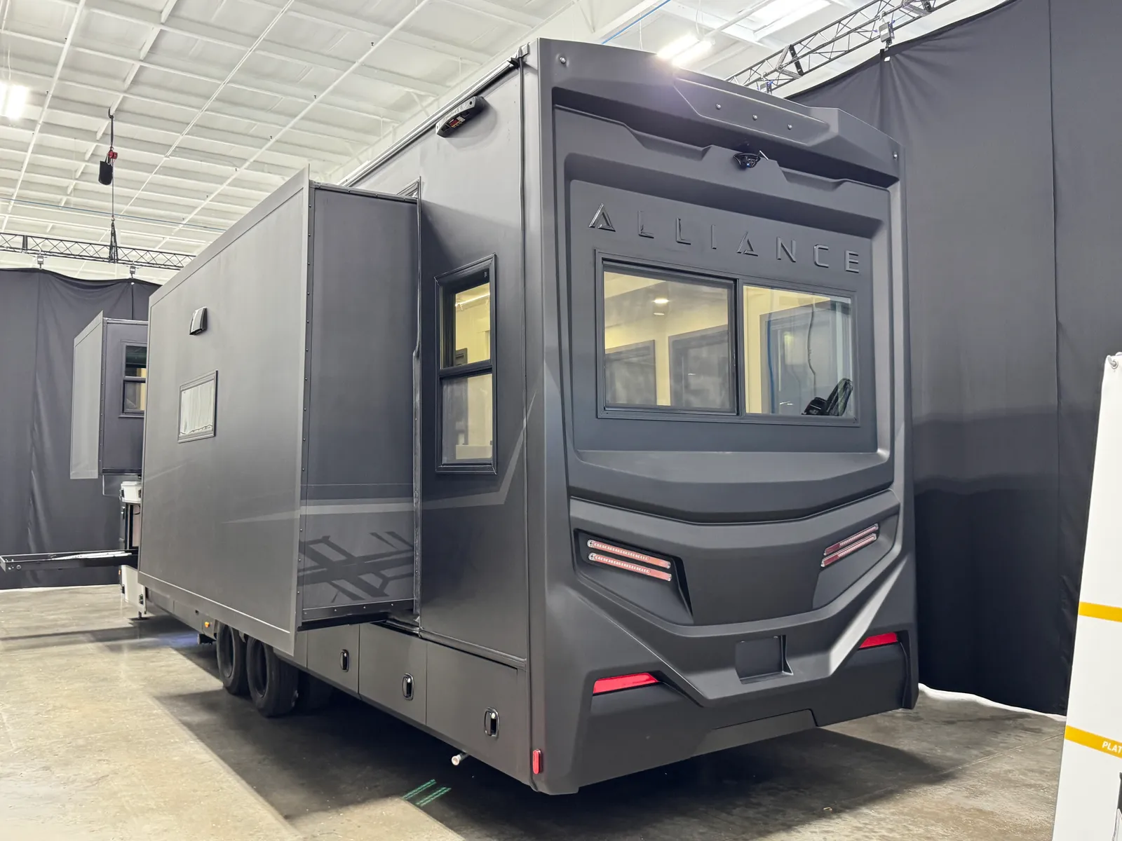 Rear three-quarter view of the Aurum's off-door side with its slides extended.